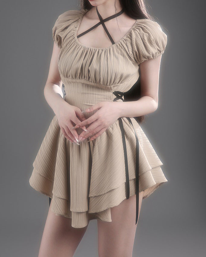 coquette mini dress in beige