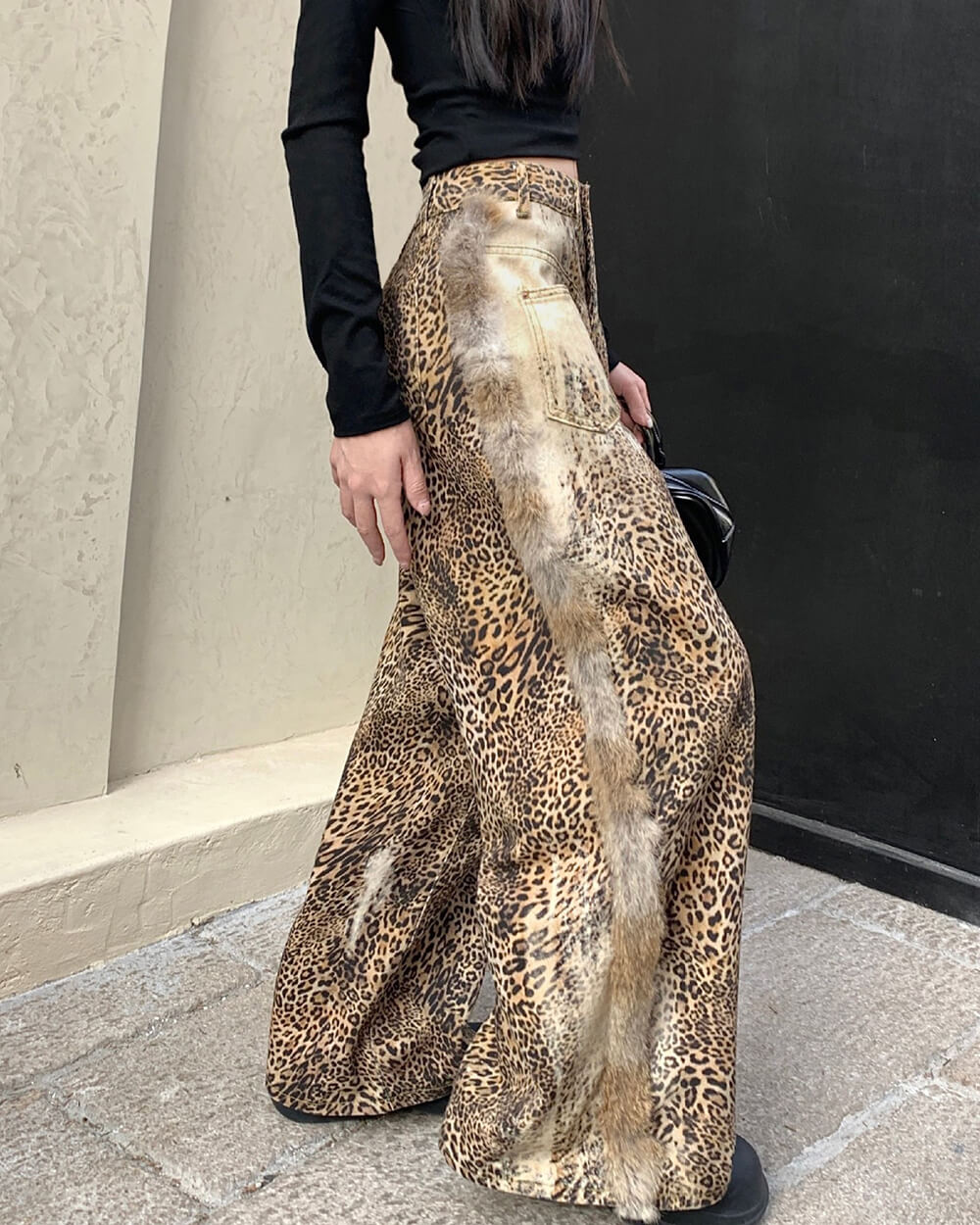 faded leopard print wide leg trousers