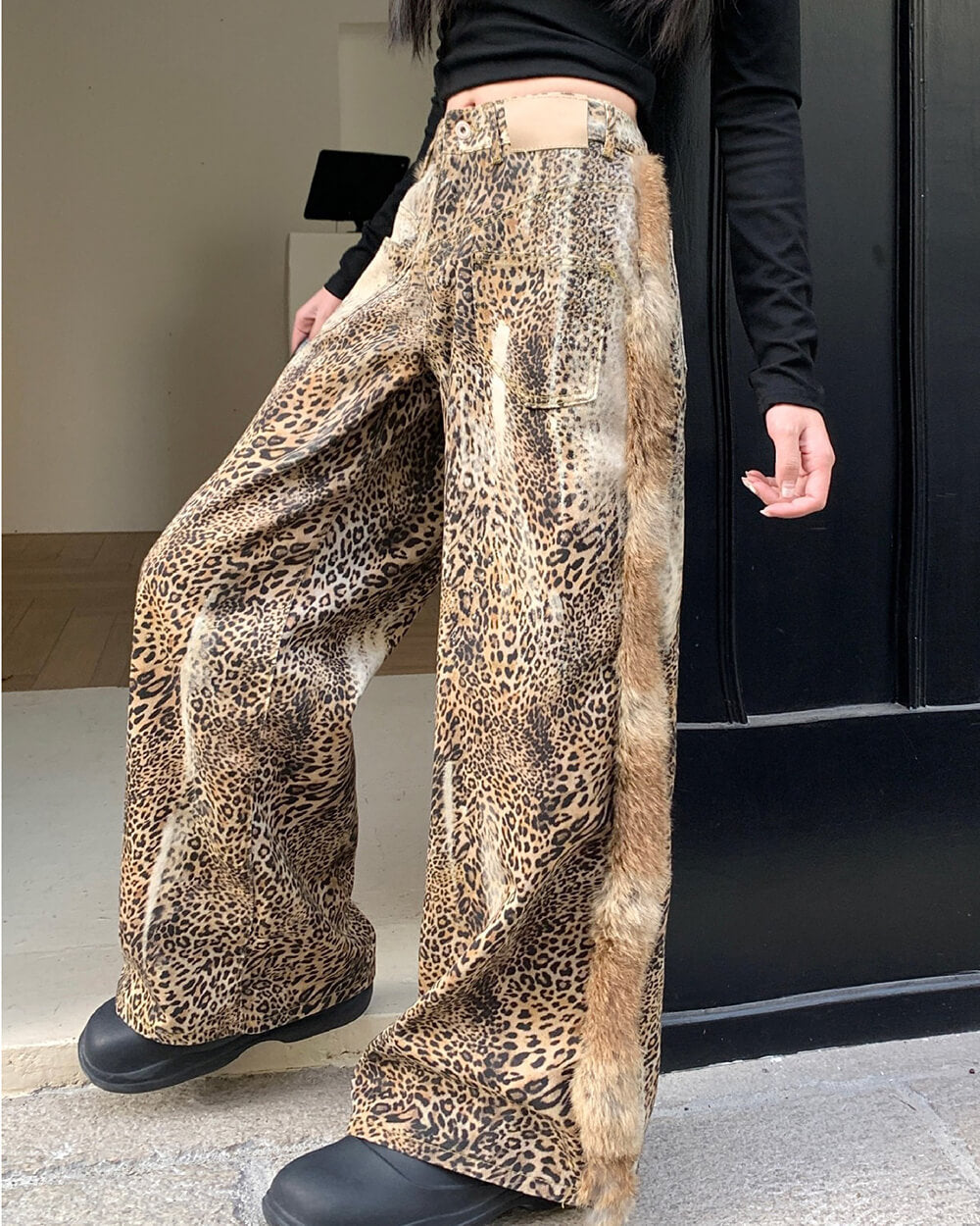 faded leopard print wide leg trousers
